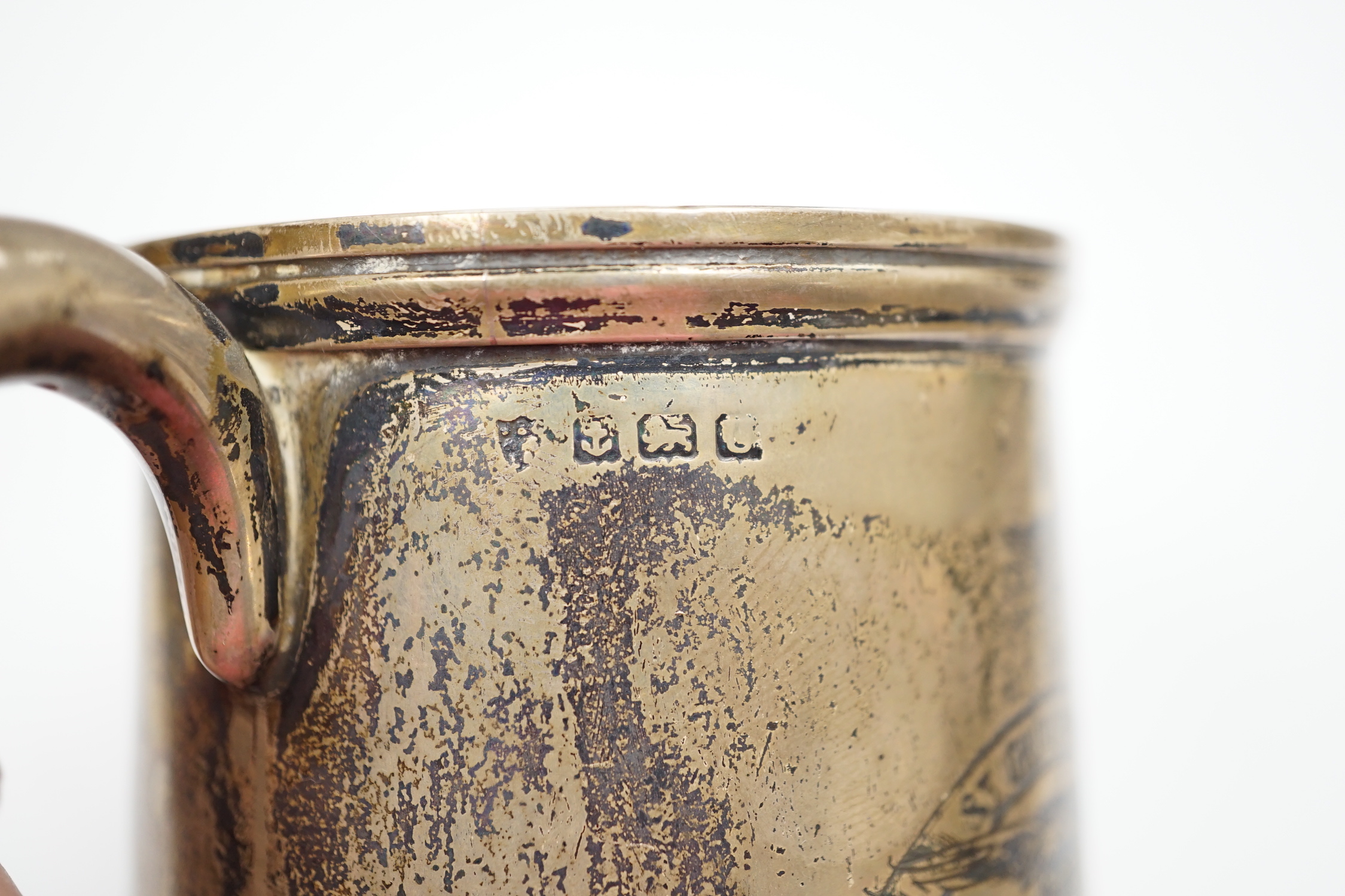 An RAF silver mug, and framed drawing of a map of Belgium and surrounding countries relating to 83rd Group Main HQ, Tactical Air Force 1944-45 together with four WWII medals in the original card, issue box; the Defence M